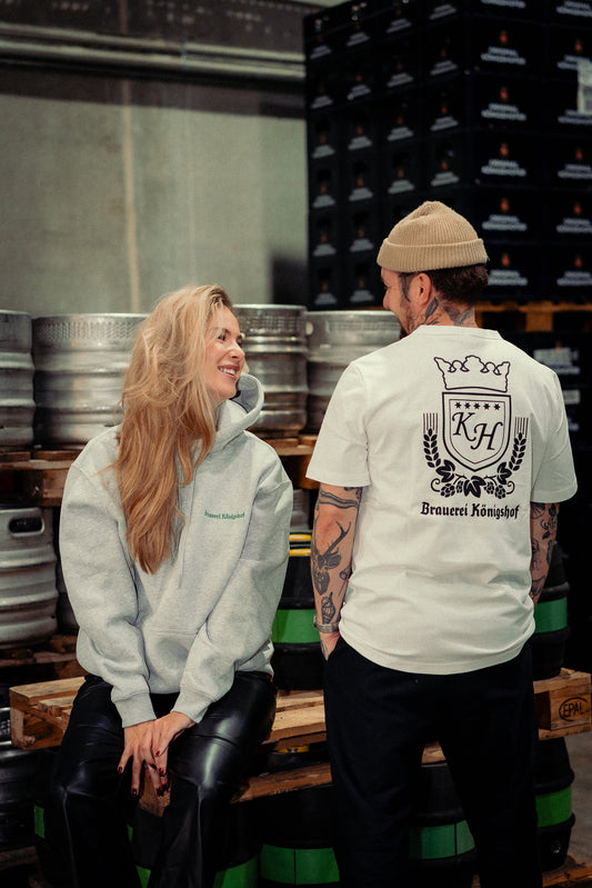 Grauer Hoodie mit grünem Stick